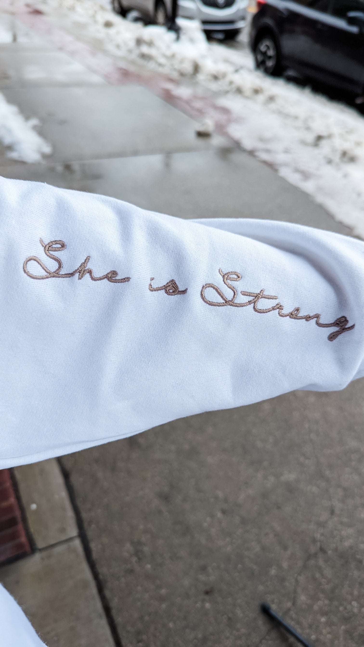 White Embroidered She Is Strong Sweatshirt